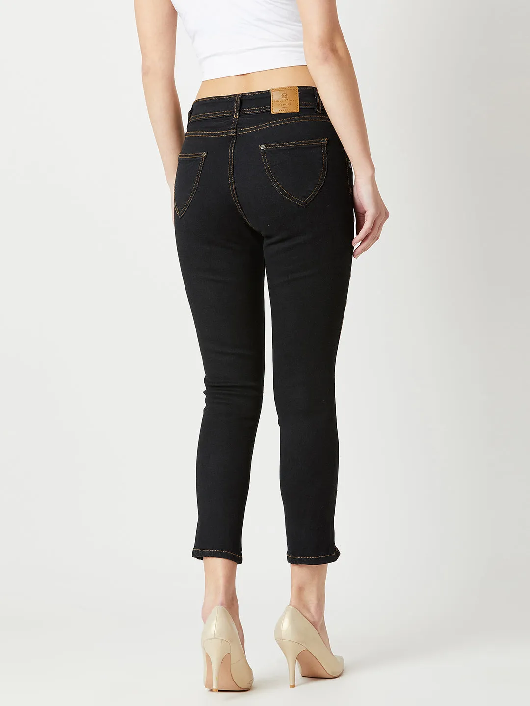 Women's Black Skinny High Rise Side Slit Solid Eyelet Embellished Cropped Length Stretchable Denim Jeans